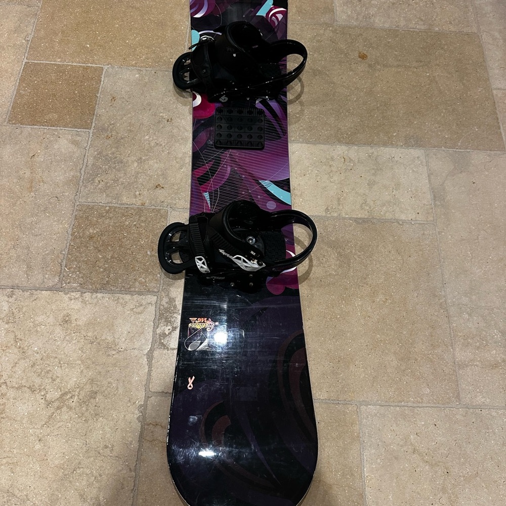 Vibrant Snowboard with Bindings